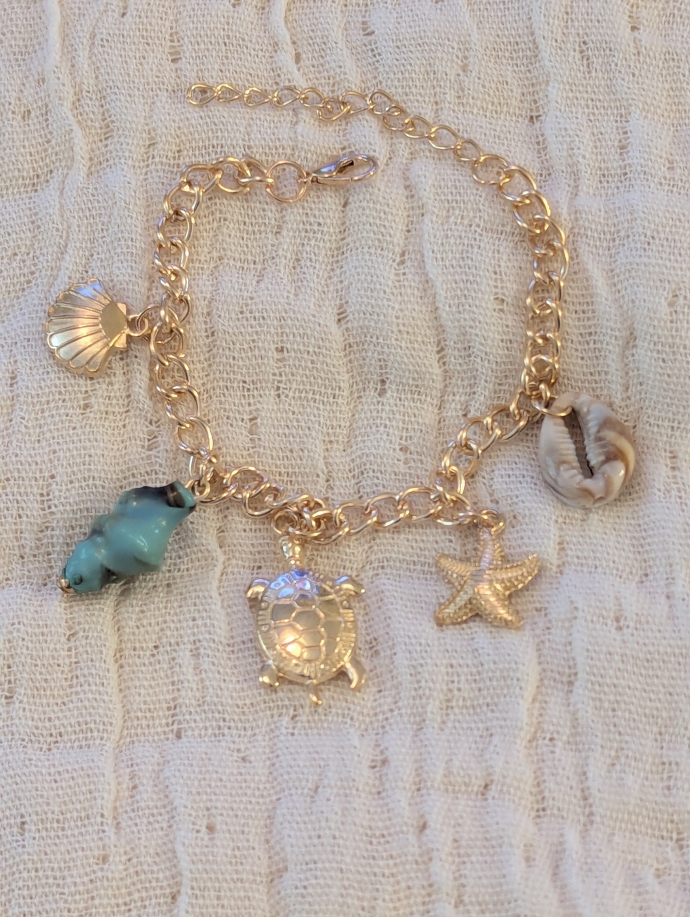 Gold-Tone Sea Life Charm Bracelet with Turquoise Shell Accent